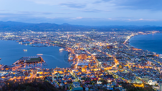 日本哈科达特市季节城市天空市中心建筑游客日落旅行海洋半岛图片