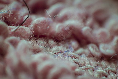 柔软的粉红色织物背景的宏观特写编织帆布毛巾柔软度毛皮奢华动物紫色材料小地毯图片