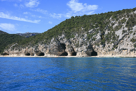 撒丁岛海岸 海滩上的岩石海岸线天空支撑异国热带海景阳光海洋天堂风景图片