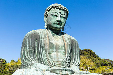 卡马库拉的佛祖地标文化大佛晴天金属天空佛教徒寺庙青铜蓝色图片