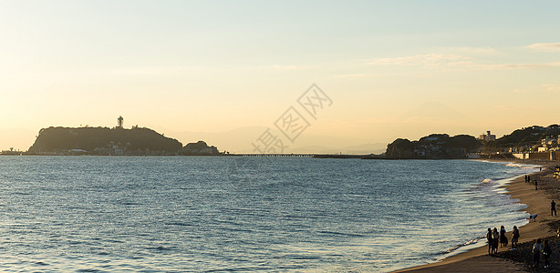 日落时休南的尤伊加哈马海岸蓝色白色海滩海洋太阳旅行天空景观城市支撑图片