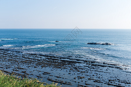 日本宫崎市的恶魔洗脸板公园海岸海景地质学海滩海洋编队海浪海岸线岩石背景图片