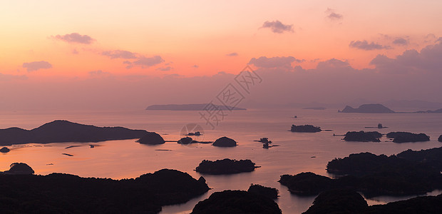 国仓岛日落晴天天际海景天空阳光农村地标太阳橙子港口图片