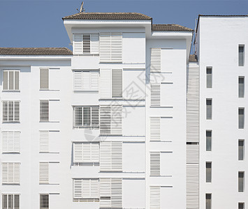 居民楼是白色的 特写u城市公寓建筑学房地产艺术建造办公室住宅窗户建筑背景图片