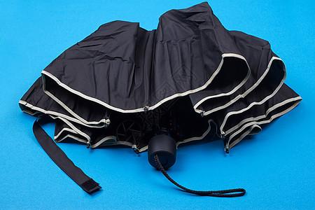 封闭的黑色黑伞警告生活危险保障曲线安全气候配饰天气纺织品图片