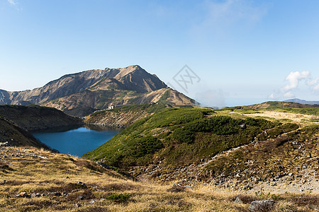 美丽的风景高山黑部观光地标天空路线假期爬坡水池植物图片