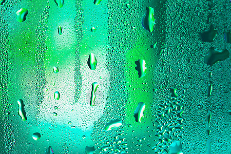玻璃上滴子宏观波纹流动液体环境抛光水滴水分蓝色雨水图片