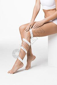 脚上有丝带的女人脱毛理疗女孩静脉曲张卫生静脉女性皮肤疼痛护理图片