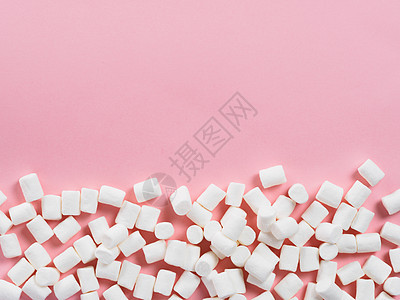 粉红色背景的棉花糖与 copyspac垃圾糖果季节小吃甜点活力圆形白色高架粉色图片