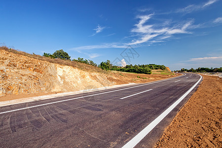 新沥青道路交通材料太阳自由地平线赛道运输柏油天空速度图片