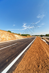 新沥青道路柏油赛道旅行速度自由蓝色石头运动天空材料图片