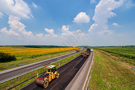 道路改造车道背景蒸汽操作员车轮柏油街道建筑橙子路面图片