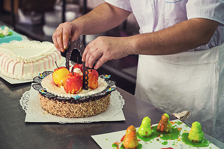 手工蛋糕制作小吃烹饪工人商业饼干面包师厨师工作植物自动化图片