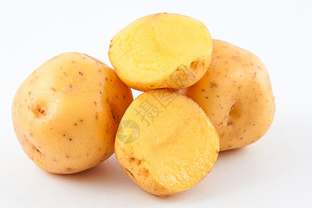 以白色背景隔离的黄土豆工作室维生素团体土豆农业食物球形块茎蔬菜植物图片