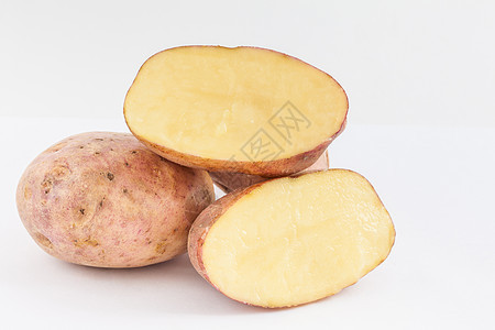 在白色背景中隔离的马铃薯索兰姆管状食物蔬菜团体农业块茎土豆黄色营养维生素植物图片