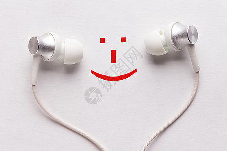 快乐的微笑和耳机蓝色技术音乐歌曲舞蹈乐趣白色图片