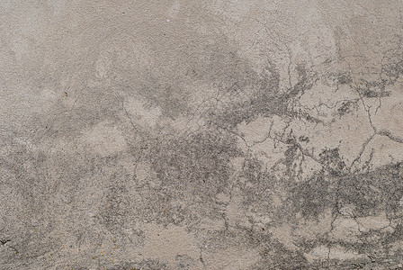 旧石膏墙的裂缝 粉刷油漆 风景风格 灰色背景 纹理石头水泥合金褐色风化墙纸棕褐色象牙图片