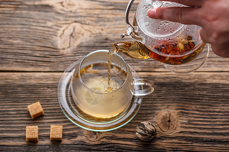 鲜花茶饮料茶壶服务风格酿造装饰棉铃玻璃叶子异国图片
