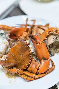 蒸汽螃蟹美食市场国王动物餐厅零售爪子海鲜烹饪奢华图片