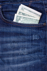 牛仔裤口袋里的美元顾客裤子金融材料贷款纺织品棉布财富牛仔布储蓄图片