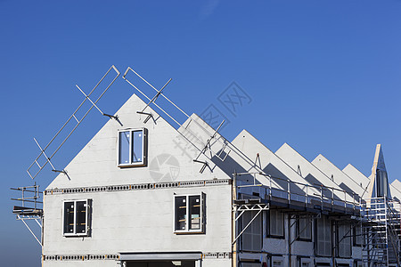 住宅建筑工地白色蓝色生长石头房子建筑学商业窗户工作天空图片