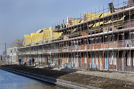 住宅建筑工地屋顶住房房子财产脚手架工作邻里工人建筑学材料图片