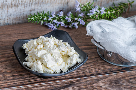 奶油奶酪一碗蓝色白色奶制品奶油状芳香木头营养小吃产品午餐图片