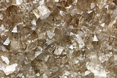 封闭的石英矿晶体团岩石材料水晶矿物学矿物宝石宏观编队棕色边缘图片