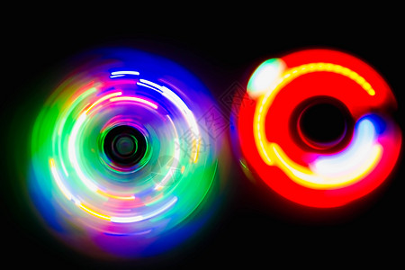 深色背景中的彩色球体光展示魔法活力音乐液体黑色反射舞蹈圆圈俱乐部图片
