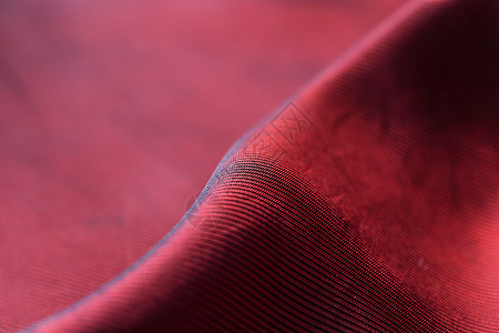 红丝绸特写红面织物背景