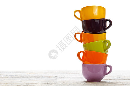 彩色杯塔台桌子陶器团体白色陶瓷咖啡杯子黄色木头绿色图片