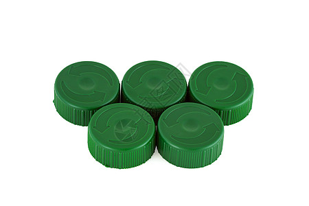 五个绿色塑料瓶盖背景图片