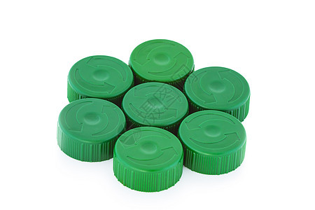 7个绿色塑料瓶盖背景图片