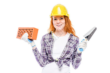 妇女建筑工 在白色背景上用砖块和粗图片