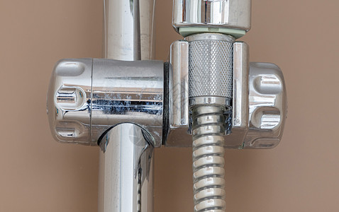 淋浴时特写水龙头管子管道金属反射合金棕色浴室图片