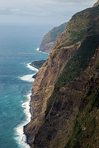 马德拉的沿海景观海岸线爬坡海岸吸引力支撑海洋多云天气地区旅行图片