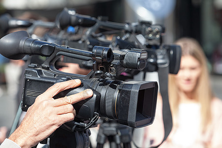 记者招待会 用摄像头拍摄一个事件相机面试新闻业电视会议视频播送图片