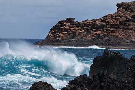 波多莫尼兹火山海岸热带风景旅行海浪岩石蓝色海洋观光海景图片