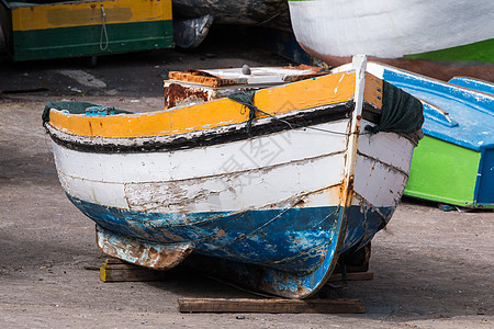 传统捕鱼船村庄海岸线蓝色游客钓鱼海岸血管渔业港口晴天图片