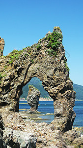 俄罗斯萨哈林岛塞卡林岛照片蓝色相片雕塑旅行天性小岛海岸全景天空图片