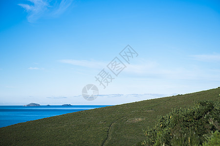 下午晚点看到布鲁尼岛海滩的景象海洋海岸风景旅行蓝色背景图片