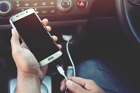 电源插座充电电话在车上收费运输手机工具黑色插头力量电池互联网男人图片