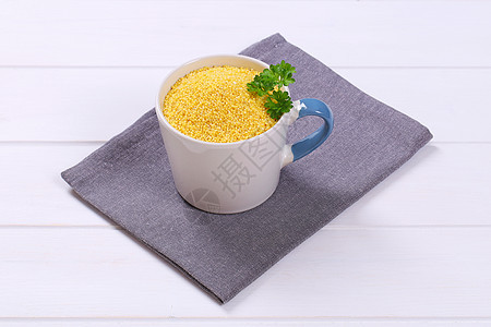 粗米谷的杯子团体珍珠背景餐垫伴奏灰色小菜粮食白色种子图片