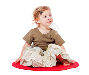 坐在托德勒的女孩乐趣女儿衣服好奇心地面喜悦白色孩子婴儿金发图片