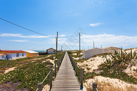 海滩房子葡萄牙  阿尔加维假期海景房沙丘房子娱乐海滩旅游旅行影响天堂背景