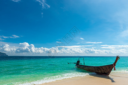 泰国传统船长尾尾巴 靠近绿绿石海滨图片