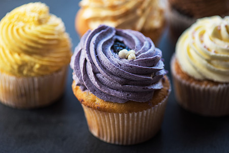 Cupcake饼 沙漠奶油美食食物石头巧克力派对蓝色庆典奶油小雨磨砂图片