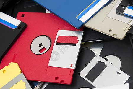软盘堆积数据白色硬件红色磁盘塑料蓝色水平贮存记忆图片