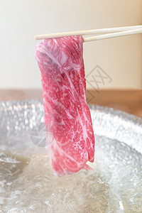 涮涮锅食物美食牛肉用餐盘子烹饪洋葱图片