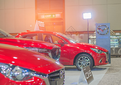 红色汽车车展汽车 汽车 汽车博览会展览陈列室大灯运输技术速度发动机运动力量图片